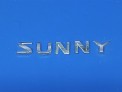 Эмблема задняя Nissan Sunny FNB15 QG15DE 2003