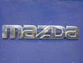 Эмблема задняя Mazda Axela BKEP LFVE 2006