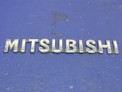 Эмблема задняя Mitsubishi Pajero Io H77W 4G94 2000