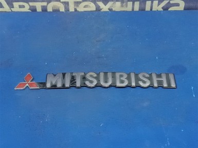 Эмблема задняя Mitsubishi Pajero V75W 6G74  2000 