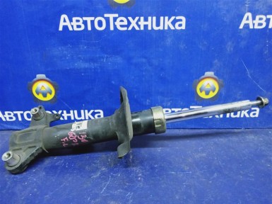 Стойка подвески передняя левая Nissan Primera  QP12 QG18DE 2002 