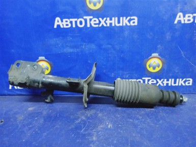 Стойка подвески передняя левая Nissan Note  E11 HR15DE 2012 