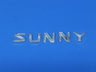 Эмблема задняя Nissan Sunny FNB15 QG15DE  2003 