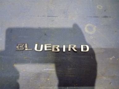 Эмблема задняя Nissan Bluebird Sylphy FG10  QG15DE 2005 