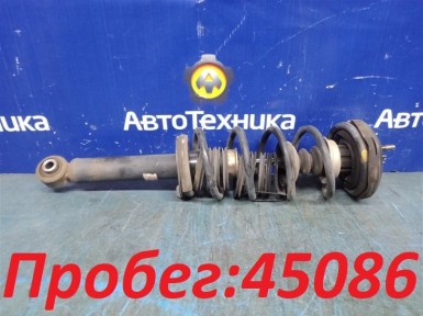 Стойка подвески задняя левая Nissan Sunny  FB14 GA15DE 1998 