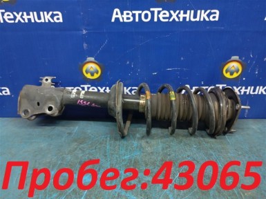 Стойка подвески передняя левая Toyota Vitz  SCP13 2SZ-FE 2003 