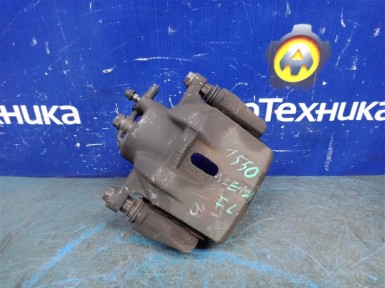 Суппорт передний левый Toyota Corolla Spacio  NZE121N 1NZ-FE 2002 