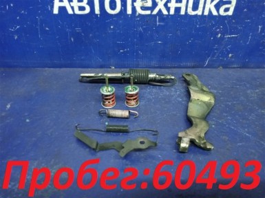 Механизм стояночного тормоза задний левый  Toyota Corolla Spacio NZE121N 1NZ-FE 2002 