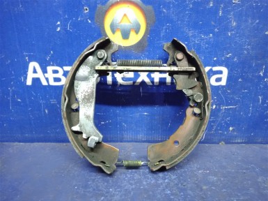 Механизм стояночного тормоза задний левый  Toyota Vitz SCP13 2SZ-FE 2003 