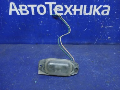 Подсветка номера задняя левая Toyota Carina  ST170 4S 1990 