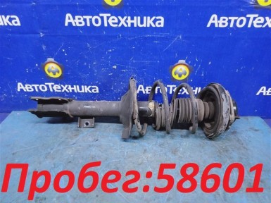 Стойка подвески задняя левая Nissan Primera  TNP12 QR20DE 2005 