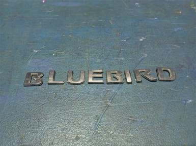 Эмблема задняя Nissan Bluebird Sylphy FG10  QG15DE 2004 