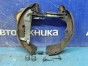 Механизм стояночного тормоза колодки барабанные разводящий механизм Subaru Impreza GG2 EJ152